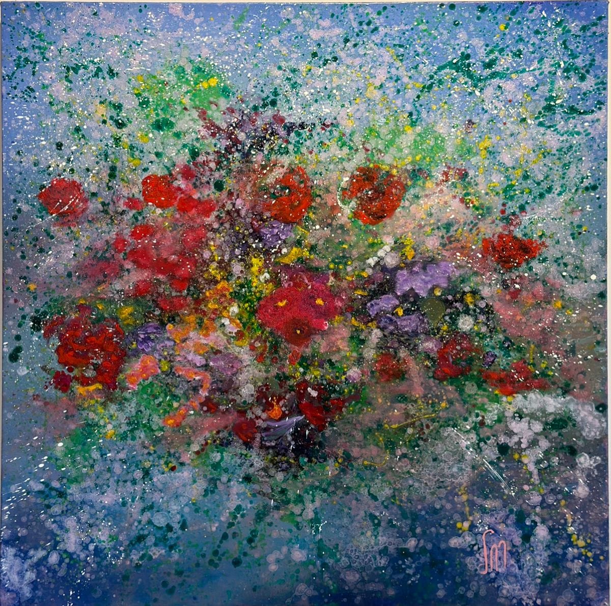 Oil painting of a bouquet of red and violet flowers bursting outward on a blue background with white and green spatter